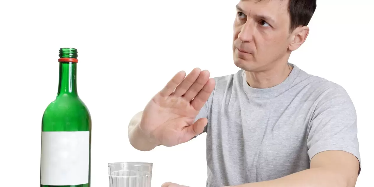 A person refuses alcohol